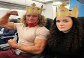 An AI image of the burger king crown racist and the subway queen. The king is flexing.
