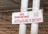 NO SMOKING YOUR LIFE MAY BE WORTHLESS BUT OUR PETROL IS VERY COSTLY