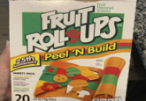 FRUIT Fruit Flavored Snacks ROLL UPS 25th Peel 'N Build Anniversary VARIETY PACK Orange Punch FLAVORED WITH OTHER NATURAL FLAVORS Red Berry FLAVORED WITH OTHER NATURAL FLAVORS Green Apple FLAVORED WITH OTHER NATURAL FLAVORS ENLARGED TO SHOW DETAIL SERVING SUGGESTION TM 20 PER ROLL -0.5 OZ (14g) ROLLS 50 0.5 50 7