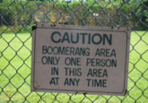 CAUTION BOOMERANG AREA ONLY ONE PERSON IN THIS AREA AT ANY TIME