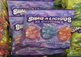 10 024 NET WT NET WT 6 SHA SH SHAQA LIGIOUS XL GUMMIES GRE MIXED TW6.20Z SH ENLARGED AND ENHANCED FOR DETAIL 110 CAR & FECES ENLARGED AND ENHANCED FOR DETAI 11 CALON PER 3 PIEC PEACH, BERRY PUNCH & ORANGE NET WT 6202 175 g PEACH, BERRY PUNCH & C NET WT 6202 (1759) NATURALLY & ARTIFICIALLY FLAVORED CAND NATURALLY & ARTIFICIALL CANDY ED B RIES 2Sou 110 CALORIES PER & PIECES M NETW םוי