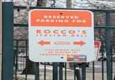 RESERVED PARKING FOR ROCCO'S ITALIAN DELI VIOLATORS WILL BE SERVED IN TOMORROW'S SAUCE. G