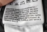 MACHINE WASH COLD SYNTHETIC/ IRON. DO NOT DRY CLEAN. DETACH BLEACH. TUMBLE DRY LOW. DO NOT PERMANENT PRESS CYCLE. DO NOT FAUX FUR TRIM. WASH AND DRY WITH LIKE COLORS. LIQUID DETERGENT IS RECOMMENDED. TUMBLE DRY WITH 3 TENNIS B