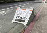 LEFT NO TURN RIGHT ONLY TURN EBMUD WATCH WARNING DO NOT EXCEED 24 LBS. SAND FILL LINE TOW AWAY NO EBMUD