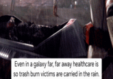 Even in a galaxy far, far away healthcare is so trash burn victims are carried in the rain.