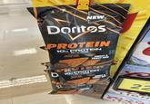 NEW Doritos SUIN BRAND PROTEIN PROTEIN 10G PROTEIN PER 1 oz SERVING See nutrition information for Total Fat content. NO COLORS FROM ARTIFICIAL SOURCES NO ARTIFICIAL FLAVORS SWEET& TANGY BBQ GUARANTEED FR UNTIL PRINTED 30JUN 2026 4.89 329307011 808 03:23 FLAVORED PROTEIN D 10G PROTEIN PER 1 oz SERVING See nutrition ration for Total Fat content NO COLORS FROM ARTIFICIAL SOURCES NO ARTIFICIAL FLAVORS SWEET& TANGY BBQ 30. 4.4 30 A100010014 12FL.O PR ER 1 oz SERVING- NO COLARS FROM CIN C Select V 22 Reg LIGH Co LIG
