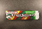 ATTOOS INSIDE! COLLECT ALL 10 WET'EM&WEAR'EM YIPES IN ACTION TATTOOS Fruit Stripe 5 JUICY FLAVORS NATURALI ARTIFICIALLY FLAVORED WEN WILD MELON, CHERRY, LEMON ORANGE, PEACH SMASH®