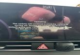 Updating... The update will continue even if the vehicle is turned off. During the update, all features, including the rear camera and audio, are restricted. Do not drive until the update is complete. A OZUM