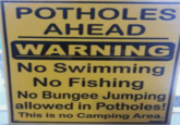 POTHOLES AHEAD WARNING No Swimming No Fishing No Bungee Jumping allowed in Potholes! This is no Camping Area.