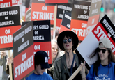 WEI TERS GUILD OF AMERICA ON STRIKE! TRIN WRITERS GUILD ERS GUILD OF AMERICA ON STRIKE OF WRITERS G WRITERS GUILD ON OF AMERICA AM WRI AMERI ON AN ON STRIST MERICA ON WRITERS STPAK GUILD OF
