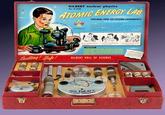 Exciting! Safe! GILBERT nuclear physics No. U-238 ATOMIC ENERGY LAB PERFORMS OVER 150 EXCITING EXPERIMENTS! FOR THE JUNIOR SCIENTIST GILBERT HALL OF SCIENCE CILMEN SILCHAMBER CLOUD WIS REPTE