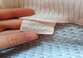 100% ACILIO 0-12 MONTHS WPL 2174 MADE IN JAPAN MACHINE WASH WARM GENTLE CYCLE WITH LIKE COLORS NO CHLORINE BLEACH TUMBLE DRY LOW