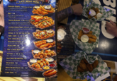 Served hot and crispy, with marinara sauce PICKLE CHIPS-$10 Golden fried, served with ranch dressing MAC N CHEESE BITES-$12 Crispy, cheesy & delicious POPPERS-6-$10/8-$12 Spicy cream cheese stuffed jalapeños DEEP FRIED MUSHROOMS-$10 Battered and fried to perfection MUNCHERS-$12 Cheddar jalapeno potato bites MINI CHICKEN TACOS (16) -$12 Mint crispy tacos filled with seasoned chicken & cheese CORN DOG-$5 PEERS ES TERSHO LATE NIGHT MEN Crispy golden chicken tenderserved CHICKEN STRIPS-$14Choice of Side) aires Buddy pue soy puestos yo LATE NIGHT MENU+ CHICKEN STRIPS-$14 (Choice of Side) Crispy golden chicken tenders served with seasoned fries and dipping sauce BLT-$14 Bacon, lettuce, tomato, and mayo, choice of side SMASH BURGER-$7.50 (Choice of Side) Juicy smashed beef patty with melted cheese; bacon, pickles, and house sauce, choice of side LOADED CHEESE FRIES-$11 (half)/$17 (full) Fries with melted cheese, bacon, and green onion (sub Tater Tots +$1) WINGS-5-$12/10-$24/15-$36 FRIES/CHIPS-lb-$8/1lb STI TOTS/ONION RINGS lb-$9$12 MOZZARELLA STICKS $12. BLT-514 Bacon, lemurg, soat, and mayo lacon, pickles, and house sauce.choice of se juicy smashed hot pay with melted chees SMASH BURGER $7.50 Fries with melt chase, but and gre LOADED CHEESE FRIES $11 half (sh Tater Tot ZARELLA STICKS $12. TS/ONION RINGS FRIES/CHIPS-%-58 151 WINGS-5-$12/10-524-15-536 CHIPS-510 EDSE BITES 12 510/8-512 SHROOMS $10 Zis-(91) S BE