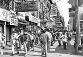 ' KURAN WEST SHANGHA CHINESE AMERICAN RESTAURANT JEWELRY ACES SUNGLASSES WATCHES INGS SOUVENIRS CHINESE RESTAURAN BAR HAS L48 Kodak CAMERAS PEPSI FLAME STEAK ΣΟΛΗ ELECTRONICSE Braband SUPERJET Halklus SEA-AIR-T 2 FOR OFFICES KS REM FOR RENT NIRS 24 HRS TS SIGNAL 265-5570 FARM GAMES LOVES HOME PIT FUN PORKING NO STANDING 101 OTHER TIMES NO STANDING EXCEPT TAXIS P