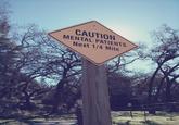 CAUTION MENTAL PATIENTS Next 1/4 Mile
