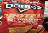 EW Doritos BRAND PROTEIN PROTEIN 10G PROTEIN PER 1 oz SERVING See nutrition information for Total Fat content. NO COLORS FROM ARTIFICIAL SOURCES NO ARTIFICIAL FLAVORS NA CHEES FLAV