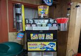 SLUSH PUPPIE SLUS ME TOEL NG The Origina SLUSH PUPPY MACHINE only 2 pumps of flavor pet drink, please if you're not sure how to use the machine, ask the cashier for help! THANK YOU!!! SLUSH PUPPIE The Original CHOOSE ONE FLAVOR OR MIX IT UP! SLUSH PUPPIE GRAPE