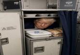 An image purportedly showing Trump hiding in a catering cart. The image has been deemed false.
