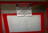 DANGER ASBESTOS MAY CAUSE CANCER CAUSES DAMAGE TO LUNGS AUTHORIZED PERSONNEL ONLY WEAR RESPIRATORY PROTECTION AND PROTECTIVE CLOTHING IN THIS AREA