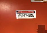 IN CASE OF FIRE EXIT BUILDING BEFORE POSTING ON SOCIAL MEDIA