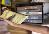 GEORGE R.R. MARTIN Liv MARTI GEORGE R.R.° MARTIN GEORGE R.R. RTIN A GAME OF THRONES 'So vivid that you'll be hooked within a few pages The Times N A FEAST FOR CROWS Voyager HARPER Voyager A DANCE WITH DRAGONSCI 2: AFTER THE FEAST A DANCE WITH DRAGONS 1: DREAMS AND DUST A STORM OF SWORDS C 2: BLOOD AND GOLD A STORM OF SWORDS 1: STEEL AND SNOW A CLASH OF- KINGS HARPER Voyager HARPER Voyager HARPER Voyager