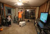 Hurricane Harvey Victims Watching The Houston Astros Win The 2017 World Series.