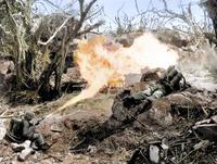 Marines torch a Japanese defensive in Iwo Jima’s Mount Suribachi by using flamethrowers in 1945. These military tools were an effective weapon for burning out entrenched fighters who would have otherwise continued to fight, costing more lives. Pictured are Pvt. Richard Klatt and PFC Wilfred Voegeli.