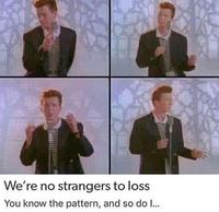 We're no strangers to loss You know the pattern, and so do I... Clothing Face Head Chin Hand Outerwear Hairstyle Arm Photograph Coat Facial expression Fashion Sleeve Gesture Collar Line Suit Adaptation Blazer People Formal wear Tie