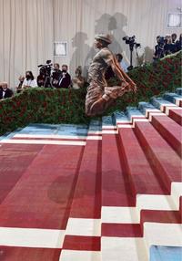 Kevin Gates jumping at MET Gala