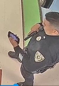 Uvalde Cop Staring at a Punisher Logo on His Phone