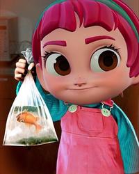 Mapi Holding a Dead Fish