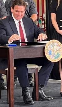 oh no he's wearing high heeled boots he must be very short it's ridiculous that he doesn't assume he's not the grea... big tall republican on the list