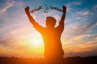 Man Breaking Chains Reaction Image