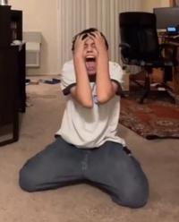 Guy Screaming on Bedroom Floor wirth hands on his hand, on his knees (reaction image)