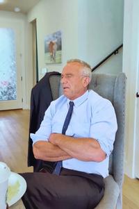 RFK Jr. Arms Crossed Confessing meme template