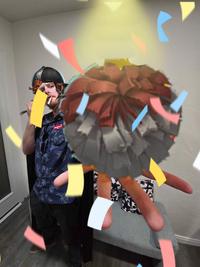 Cheerleader Holding a Pom Pom