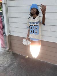 A "photoshopped":https://knowyourmeme.com/memes/sites/photoshop image of a Black man wearing a blue hat taking off like a rocket ship that was posted to "Twitter / X":https://knowyourmeme.com/memes/sites/twitter-x in May 2024.