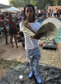 The original photograph of a guy doing a spiral money spread at a pool party, which resembled the "Golden Ratio":https://knowyourmeme.com/memes/the-golden-ratio from the Fibonacci sequence.