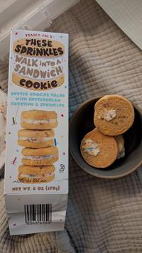 TRADER JOE'S THESE SPRINKLES WALK INTO A SANDWICH Cookie BUTTER COOKIES FILLED WITH BUTTERCREAM FROSTING & SPRINKLES SELL Y AUG 19 25 A6 NET WT. 6 OZ (170g) 0065 4159 DAIRY