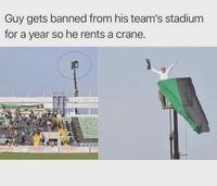 Guy gets banned from his team's stadium for a year so he rents a crane.