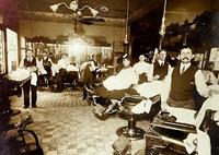 A barbershop in the early 1900s