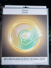 ROOM™ ROOM RECORD PLAYER ACRYLIC LED WALL LIGHT Orange & Green LEDS Battery Powered Indoor Use Only 8.34in x 8.34in x 0.62in (21.2cm x 21.2cm x 1.6cm) Requires 3 (Three) 1.5V AA Alkaline Batteries (Not Included)