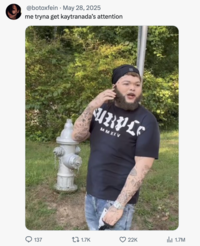 X user @botoxfein tweeted a still from Druski's "White Face" video, writing, "me tryna get kaytranada’s attention," and gathering over 22,000 likes in a day. The tweet presupposes that Kaytranada is only into light-skinned people.