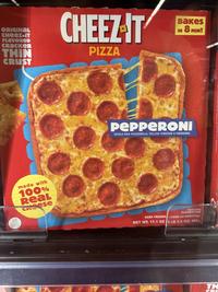 ORIGINAL CHEEZ-IT FLAVORED CRACKER THIN CRUST CHEEZ-IT PIZZA U.S. made with 100% Real Cheese Bakes 8 MIN! IN PEPPERONI WHOLE MILK MOZZARELLA, YELLOW CHEDDAR & MARINARA SERVING SUGGESTION KEEP FROZEN COOK AS DIRECTED. NET WT. 17.1 OZ LB 1.1 OZ) 485g TH CRL