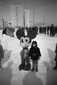 Kid poses with ''Mickey Mouse'' in Pripyat in 1980, six years before the Chernobyl disaster.