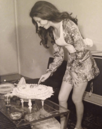 Iranian woman cutting a cake in Iran in 1973