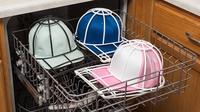 A holder to clean hats in the dishwasher