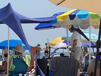Someone's DJing at a beach
