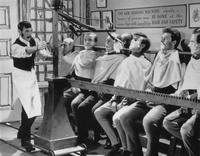可 THE NEW SHAVING MACHINE whereby " umber of persons may BE DONE at the same time with expedition EASE AND SAFETY