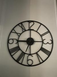 At certain times, the hands blend into the clock